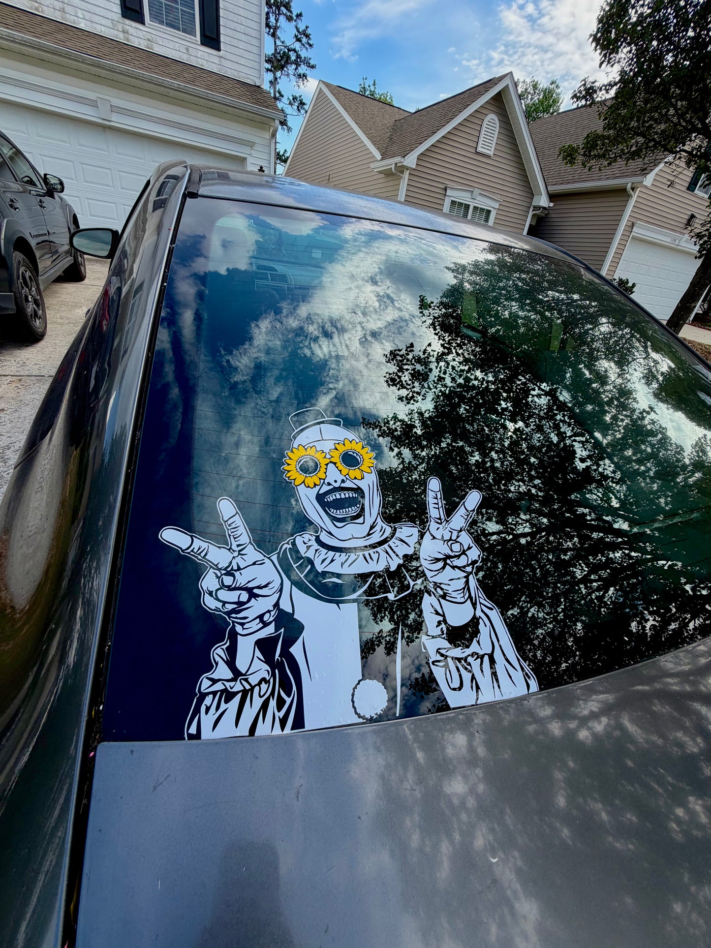 Art the Clown with Sun flowers