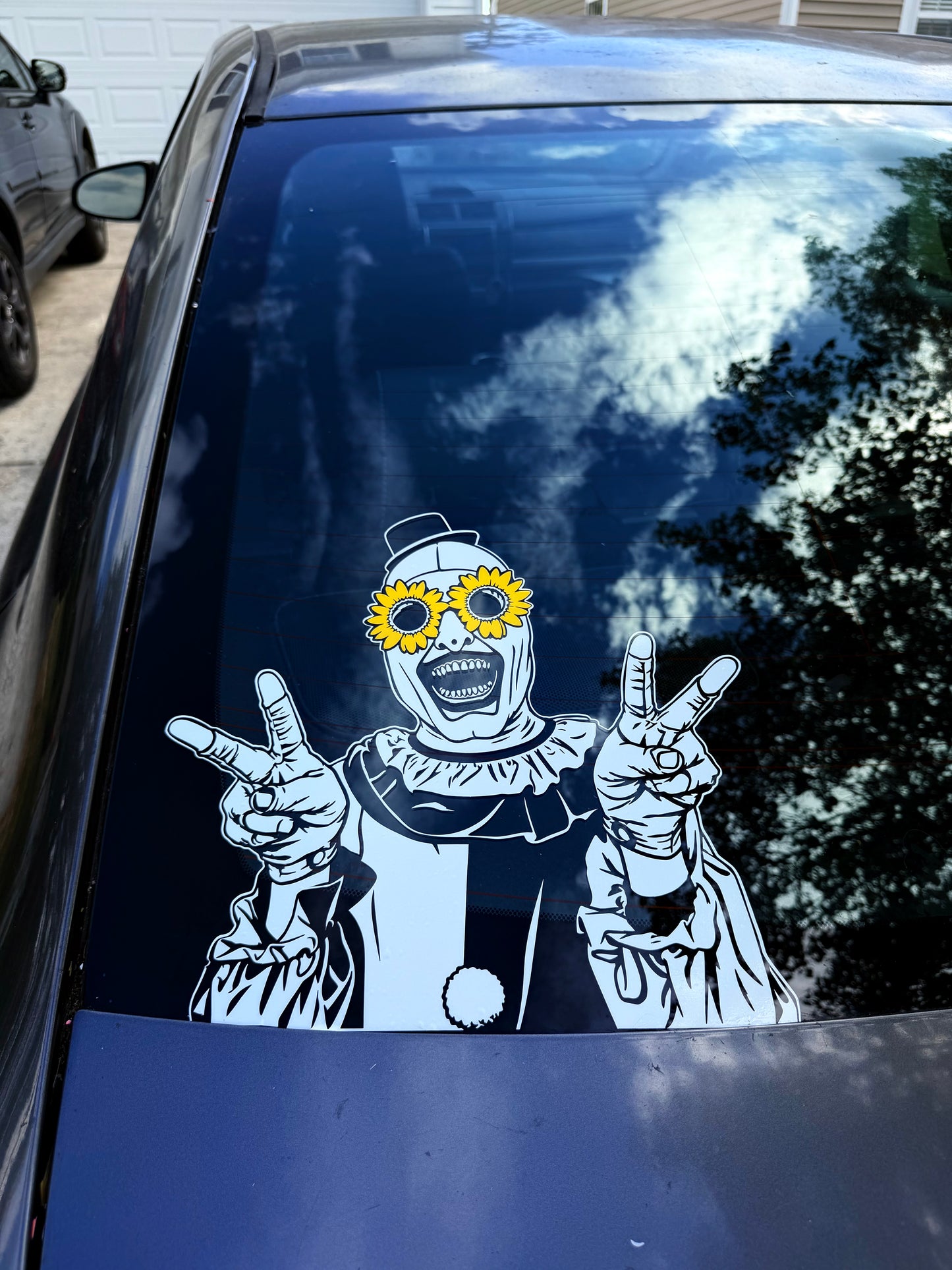 Art the Clown with Sun flowers